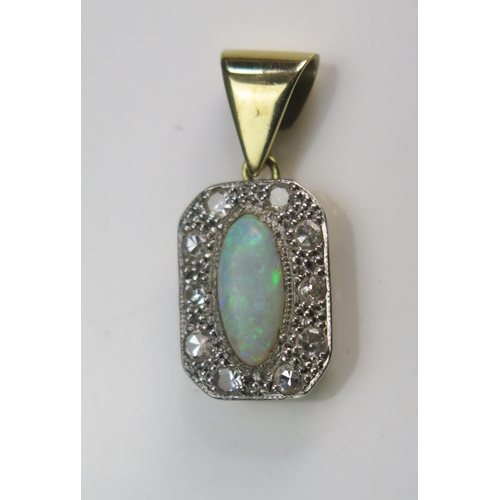 119 - An Opal and Diamond Pendant in a precious yellow metal setting, 19.8mm drop, KEE tests as 14ct, 1.73... 