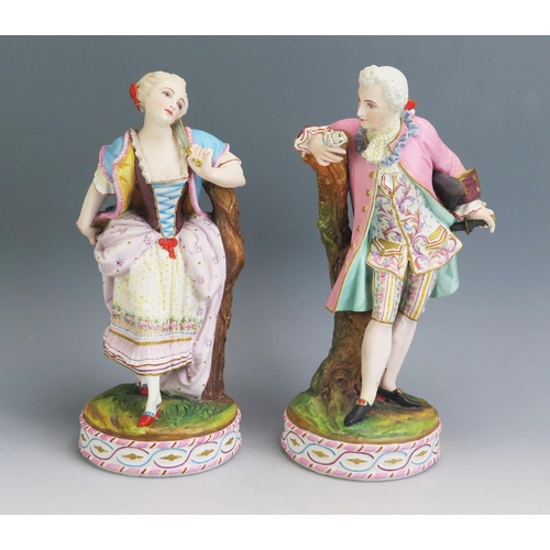 1192 - A pair of continental bisque porcelain figures of a gallant and lady, raised on circular bases, 25cm... 