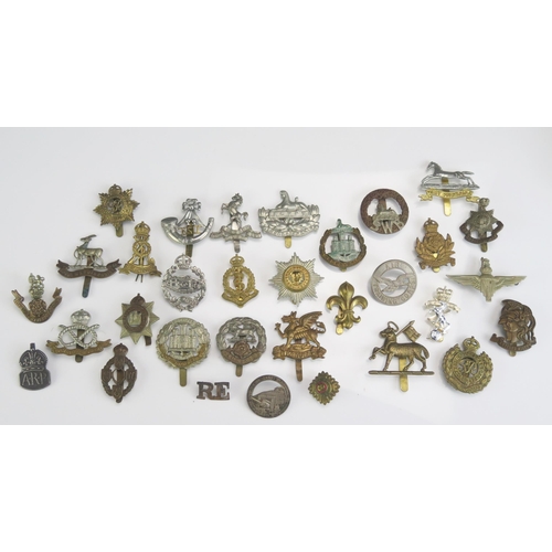 1202F - A collection of British army cap badges including South Wales Borderers, Buffs, Royal west Kent, RAM... 