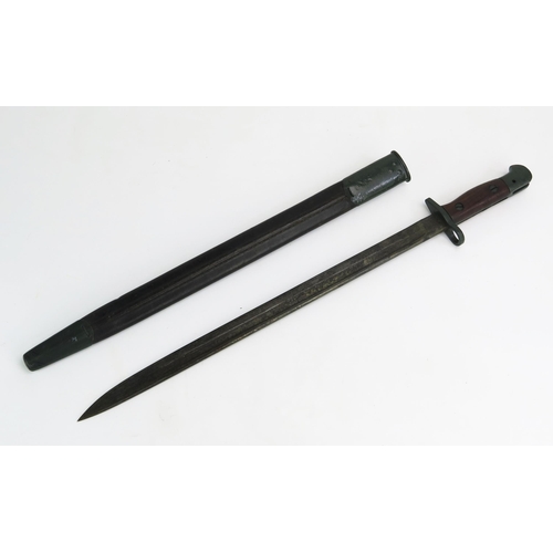 1203 - A British 1907 pattern bayonet, with 43cm fullered blade, with wood grips, contained in a leather sh... 