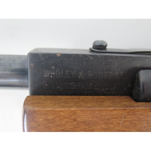 1205A - A Webley Xocet .22 calibre air rifle, fitted with a Marchwood 3-9 x 40 telescopic sight, (stock crac... 