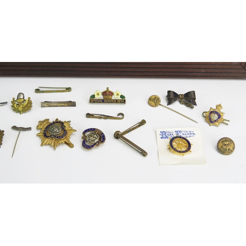 1206 - A Princess Mary Christmas box, containing assorted British Legion and other badges together with thr... 