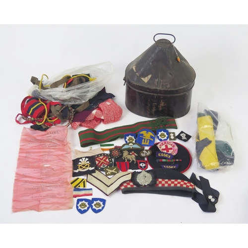 1224 - An Argyll & Sutherland Highlanders Glengarry, japanned metal hat box, assorted cloth badges, sashes,... 