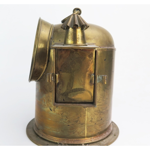 1229 - A brass ships binnacle, stamped Vapor Oceano,  with gimbal mounted compass and light holder to the s... 