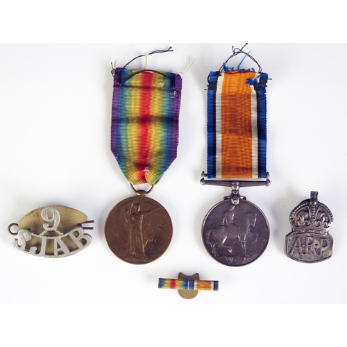 1240 - A World war One pair to S-36158. Pte. T.C.Backhouse Rif Brig. includes War and Victory medals, silve... 