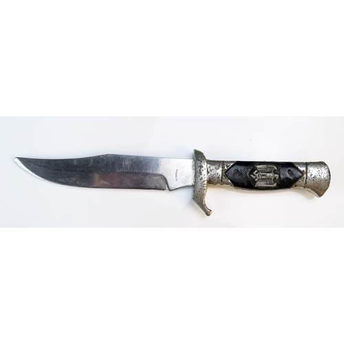 1244B - A replica World War II German fighting knife, with 15cm blade and chequered celluloid grip.  WE DO N... 