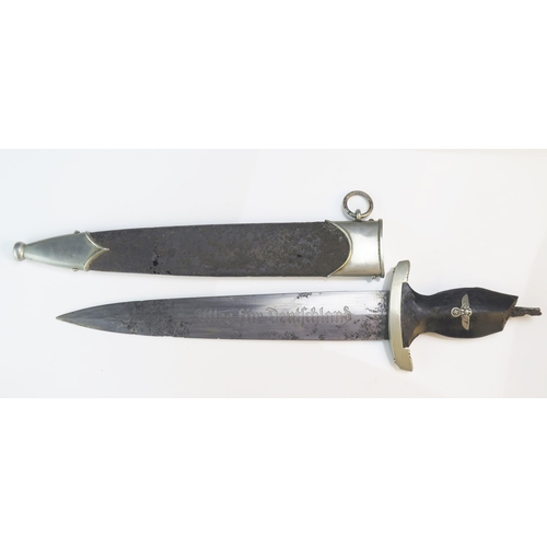 1248 - A Third Reich Period SS dagger, with 22cm etched double edged blade, damaged grip, contained in a me... 