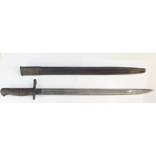 1249 - An American P17 bayonet, with 43cm fullered single edge blade by Remington, dated 1915, with wood gr... 