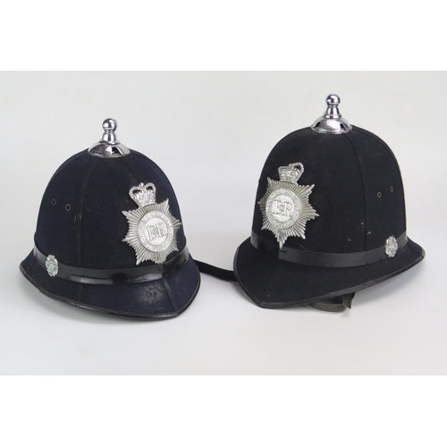 1253 - Two Devon & Cornwall Constabulary policeman's helmets. (2).