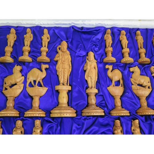 1255 - An Indian carved sandal wood chess set both sides left natural, one side with black bases, contained... 