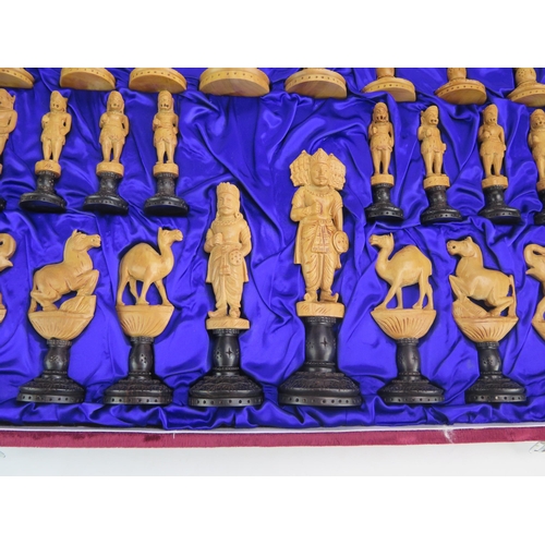 1255 - An Indian carved sandal wood chess set both sides left natural, one side with black bases, contained... 