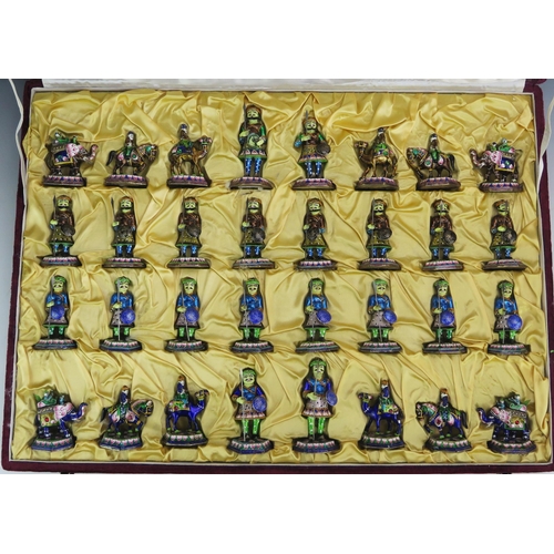 1256 - An Indian metal and enamelled chess set, the pieces modelled as warriors, the king 9.5cm high, the p... 