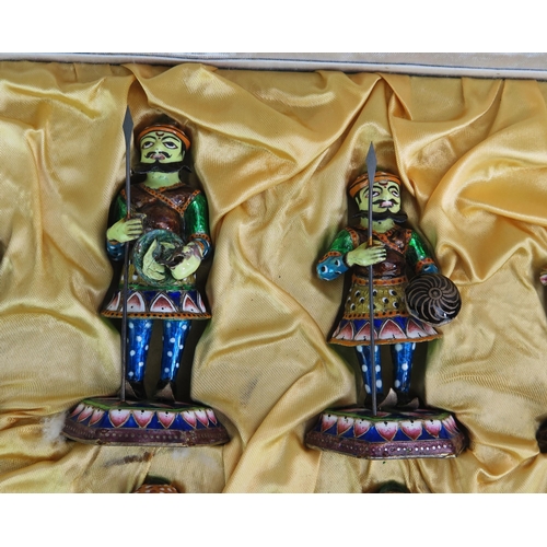 1256 - An Indian metal and enamelled chess set, the pieces modelled as warriors, the king 9.5cm high, the p... 