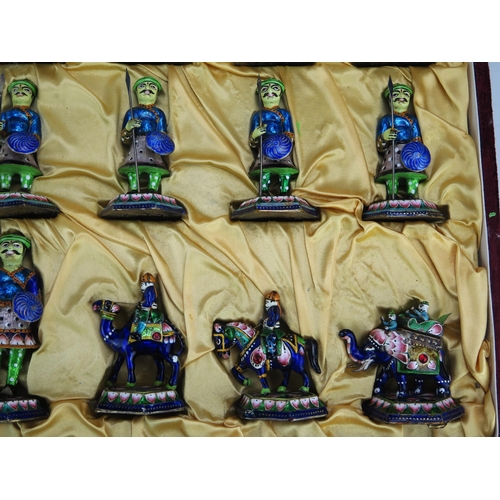 1256 - An Indian metal and enamelled chess set, the pieces modelled as warriors, the king 9.5cm high, the p... 