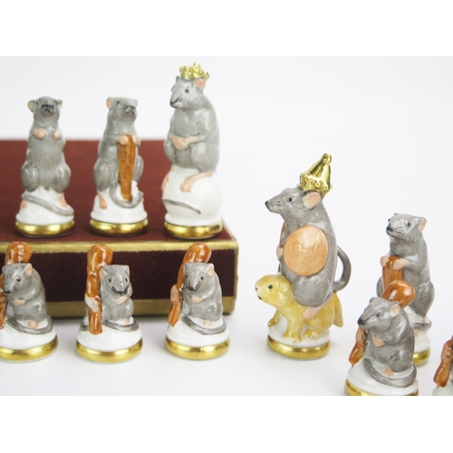 1256A - Ernst Bohne Söhne Rudolstadt, a porcelain Mouse chess set, one side white the other grey, the king 7... 