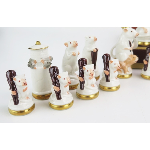 1256A - Ernst Bohne Söhne Rudolstadt, a porcelain Mouse chess set, one side white the other grey, the king 7... 