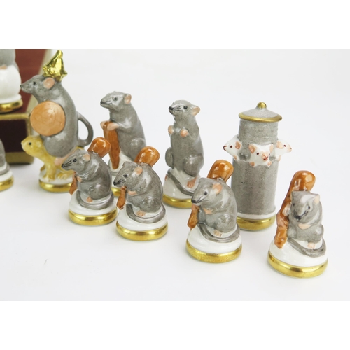 1256A - Ernst Bohne Söhne Rudolstadt, a porcelain Mouse chess set, one side white the other grey, the king 7... 