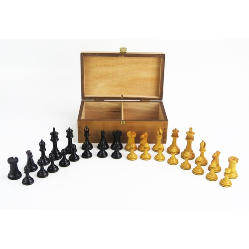 1257 - A 19th century boxwood Staunton pattern chess set one side left natural the other ebonised, the king... 