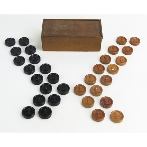 1259 - A Bakelite combination chess and draughts set, with brown and black discs, the chess pieces raised i... 