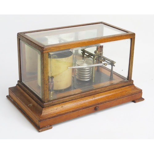 1266 - Yeates & Son, Dublin, an oak cased barograph, with seven tier vacuum and single recording arm, with ... 