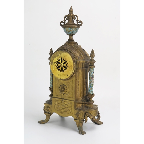 1268 - A late 19th century gilt metal and champlevé enamel mantel clock, of arched outline with urn finial,... 