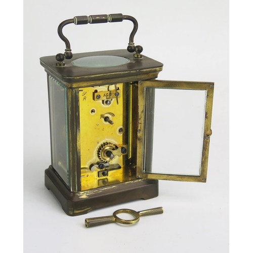 1269 - A French brass carriage timepiece, with 6cm Roman dial, the movement with lever platform escapement.... 