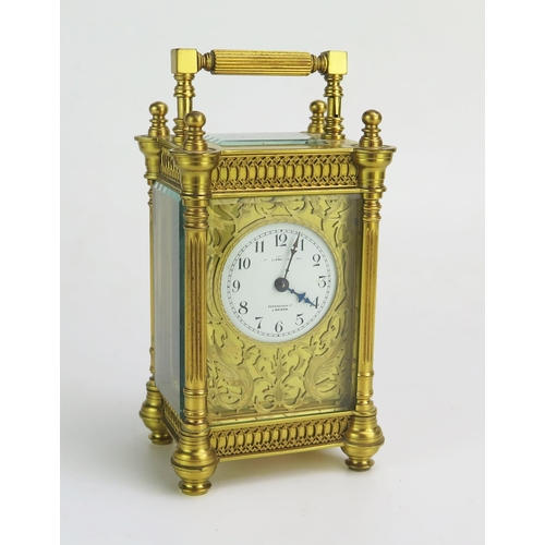 1270 - A 19th century French gilt brass carriage By Richard & Co, with 4.5cm Arabic dial, within a cut bras... 