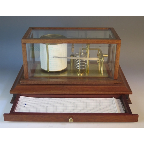 1280 - Russell, Norwich, a lacquered brass barograph, with eight tier vacuum, and single recording arm, and... 