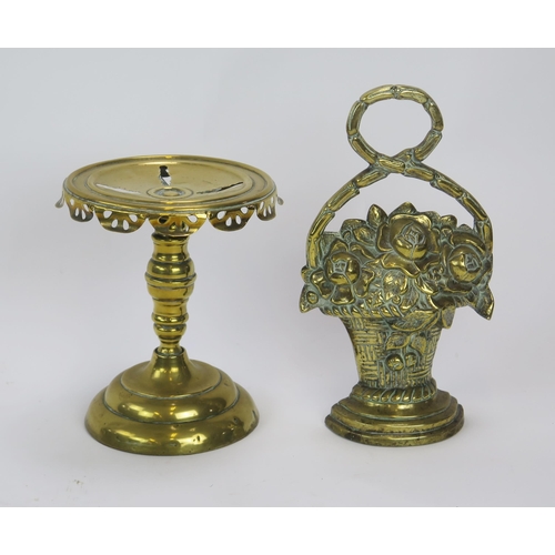 1296 - A Victorian brass trivet of circular outline, with pierced top and rim, on a knopped stem and steppe... 