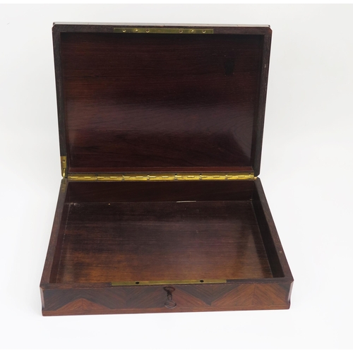 1304 - A late 19th century French kingwood and brass strung box of rectangular outline, with quarter veneer... 