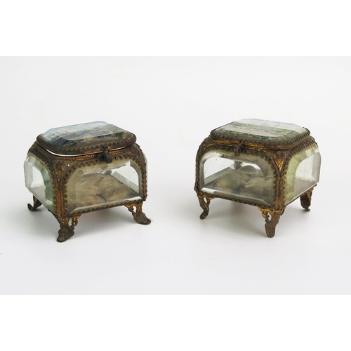 1308 - A pair of late Victorian glass and gilt metal mounted bijouterie display cases, of square outline,  ... 