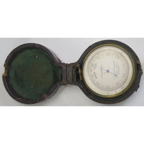 1315A - Yates & Son, Dublin, a gilt brass pocket barometer, with silvered scale contained in its Morocco lea... 