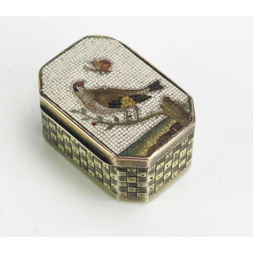 A George III silver gilt and micromosaic decorated patch box, maker TH?, London, 1802, of rectangular outline with canted corners, the hinged lid decorated with a micromosaic of a bird and butterfly, with chequered decoration to the sides, 4.75cm wide. gross weight 18gms, 0.58ozs