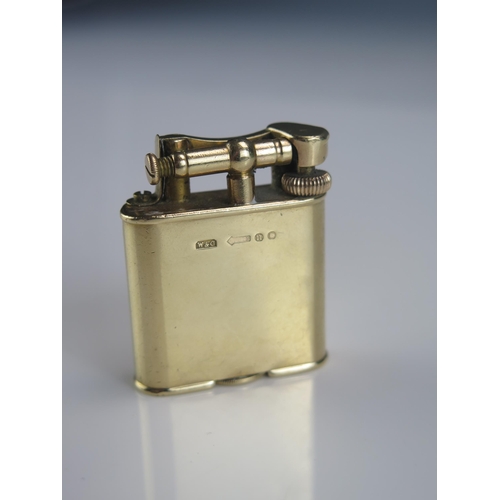 1329 - A George V 9ct gold Dunhill petrol lighter, maker's mark W & G, London, 1928, gross weight 42.9gms,