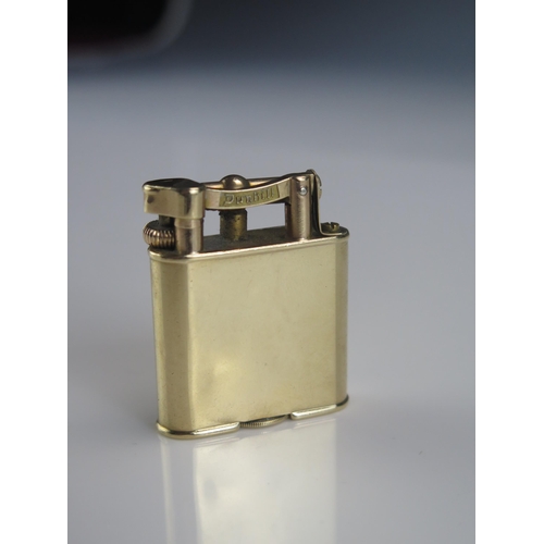 1329 - A George V 9ct gold Dunhill petrol lighter, maker's mark W & G, London, 1928, gross weight 42.9gms,