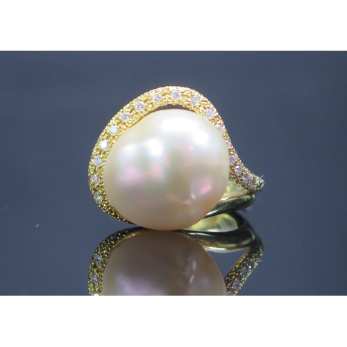 133 - An 18ct Gold, Baroque Pearl or Cultured Pearl and Diamond Ring, 19.5mm head, stamped 18K, .2ct of di... 