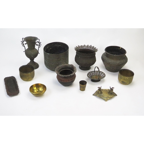 1341 - A collection of assorted metal wares including jardinières, vases beakers, pen stand etc.