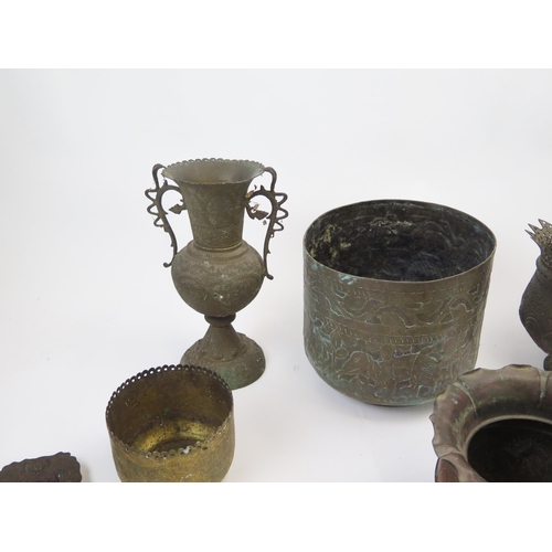 1341 - A collection of assorted metal wares including jardinières, vases beakers, pen stand etc.