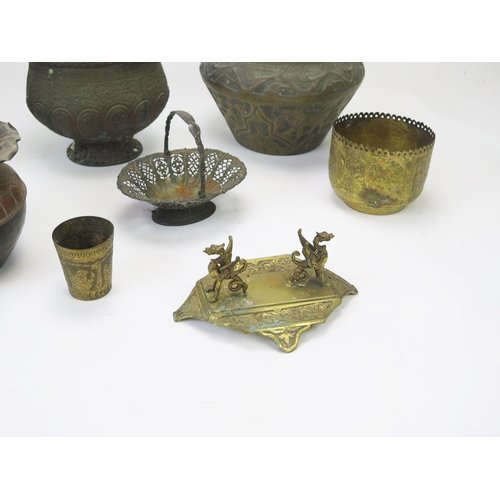 1341 - A collection of assorted metal wares including jardinières, vases beakers, pen stand etc.