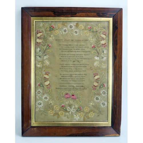 1352 - A Victorian needlework sampler, with central verse, enclosed by a floral meander border, worked by I... 