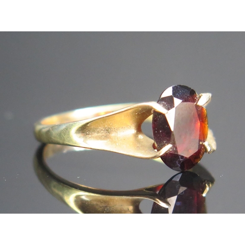 140 - A 9ct Gold and Garnet Ring, size O, hallmarked, 2.89g