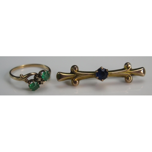 144 - A Precious Yellow Metal and Paste Ring (size M, 1.83g) and a 9ct gold and paste brooch (1.7g)