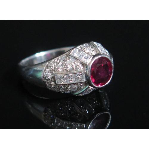 147 - A Platinum, Ruby and Diamond Bombe Ring, c. 6.5x6.3mm principal stone, hallmarked, size L.75, 7.55g