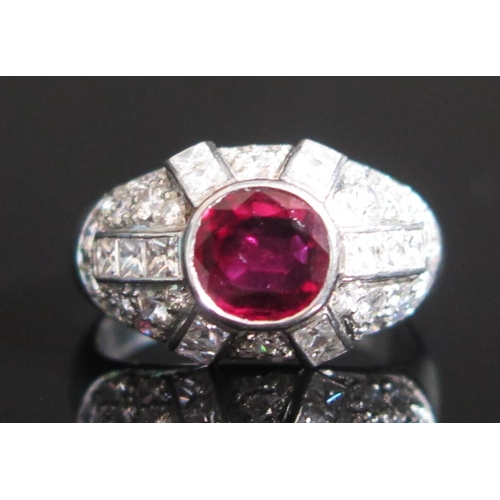 147 - A Platinum, Ruby and Diamond Bombe Ring, c. 6.5x6.3mm principal stone, hallmarked, size L.75, 7.55g