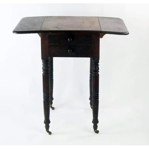 1508 - A Victorian mahogany Pembroke table, the top with two hinged leaves, having to end frieze drawers, r... 