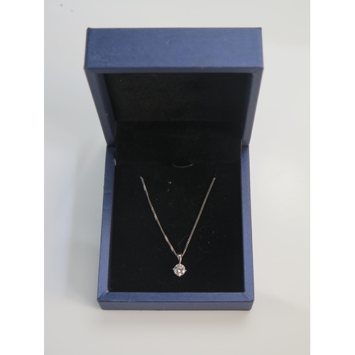 152 - An 18ct White Gold and Diamond Pendant, 5.6mm brilliant round cut and on an 18ct 18