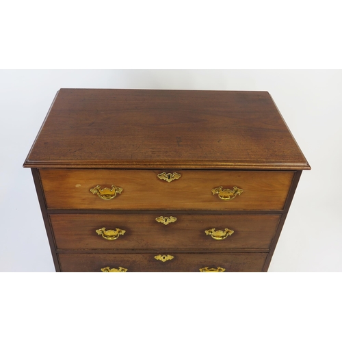 1522 - A Georgian mahogany chest, the rectangular top with a moulded edge above three long drawers raised o... 