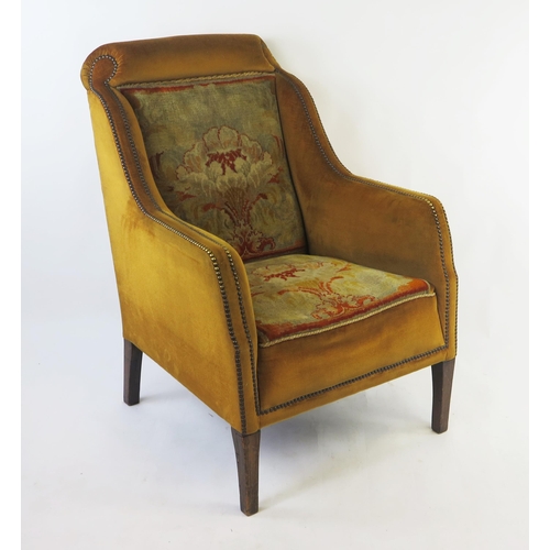 1530 - A 19th century fully upholstered armchair, with padded scroll back, padded armrests with a stuff ove... 