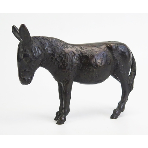 1547 - A bronze study of a donkey, unsigned, 21cm long.