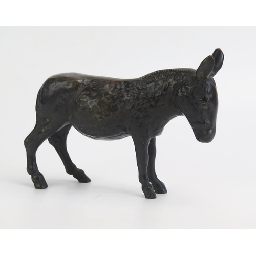 1547 - A bronze study of a donkey, unsigned, 21cm long.